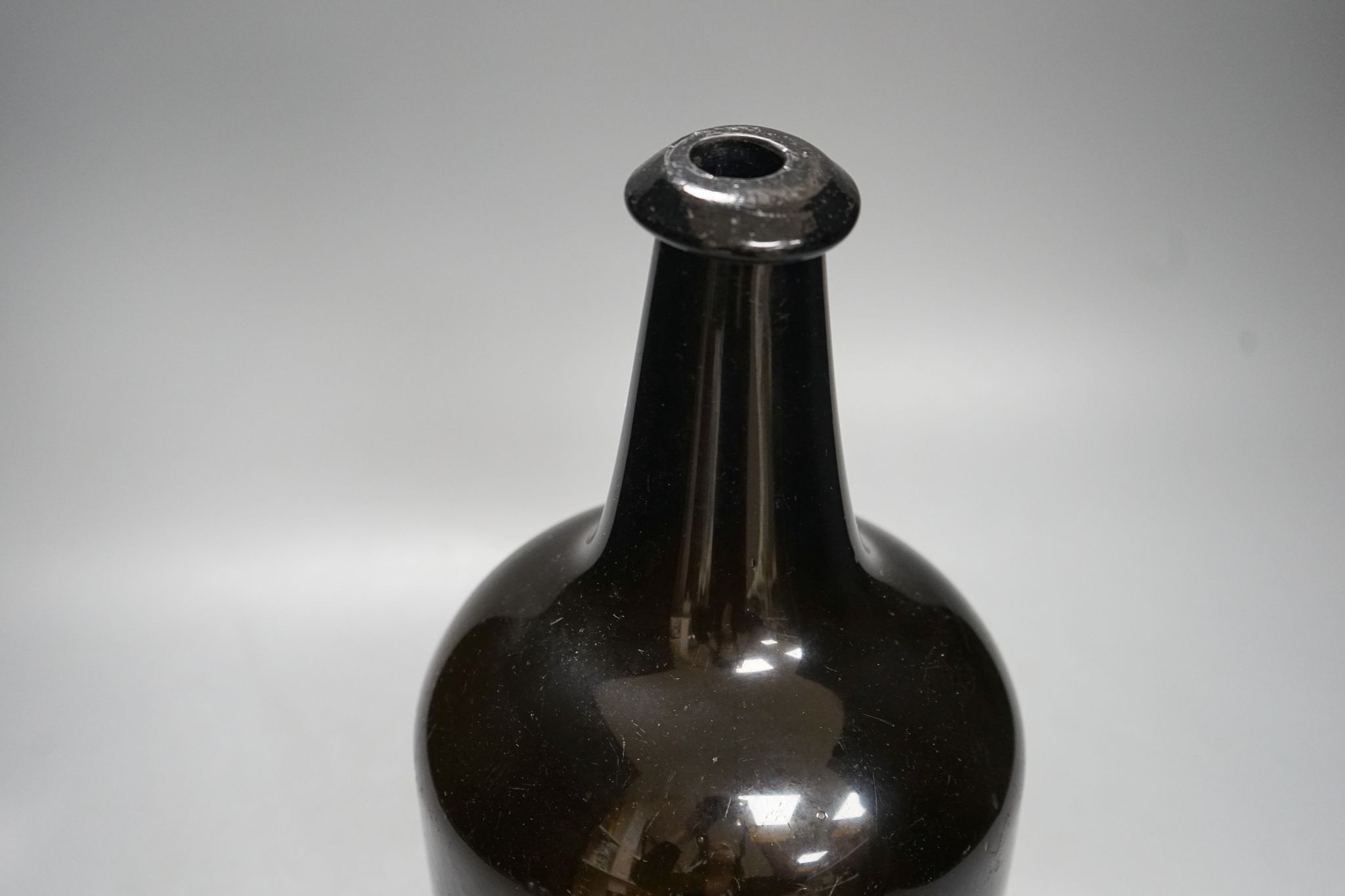 An unusually large 18th century mallet-shape wine bottle, 35cm